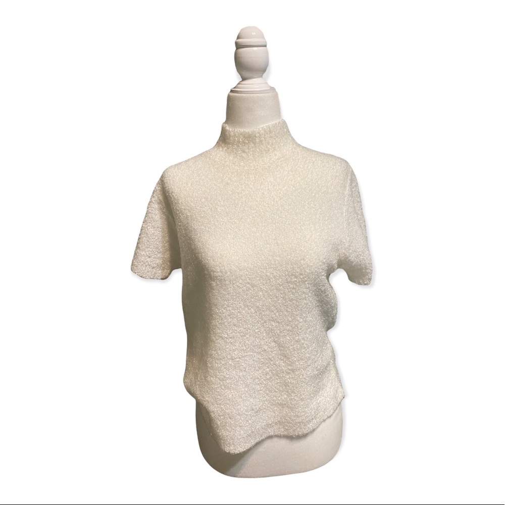 white fuzzy turtleneck shirt sleeve top